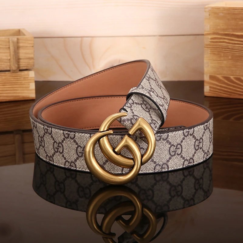 A Double G embossed leather belt inspired by classic Gucci elements. - rep paski